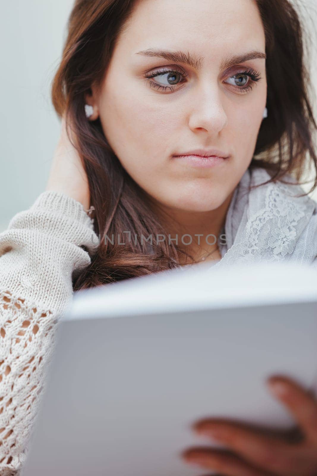 Reading is always challenging, as is studying. At the same time it is tiring and sucks up energy and at the same time it nourishes us and fills us with knowledge and new diverse energies. Young woman