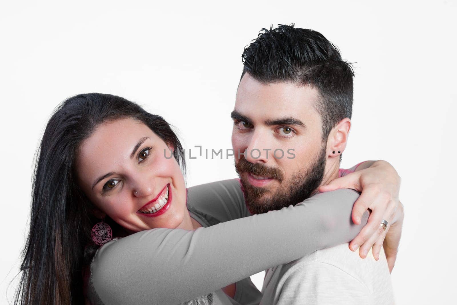 Isolated on white, a proud man feels virile as the woman who loves him embraces, joyously yielding to his body. Our worth is self-defined, yet in relationships, acknowledgment always depends on the ot