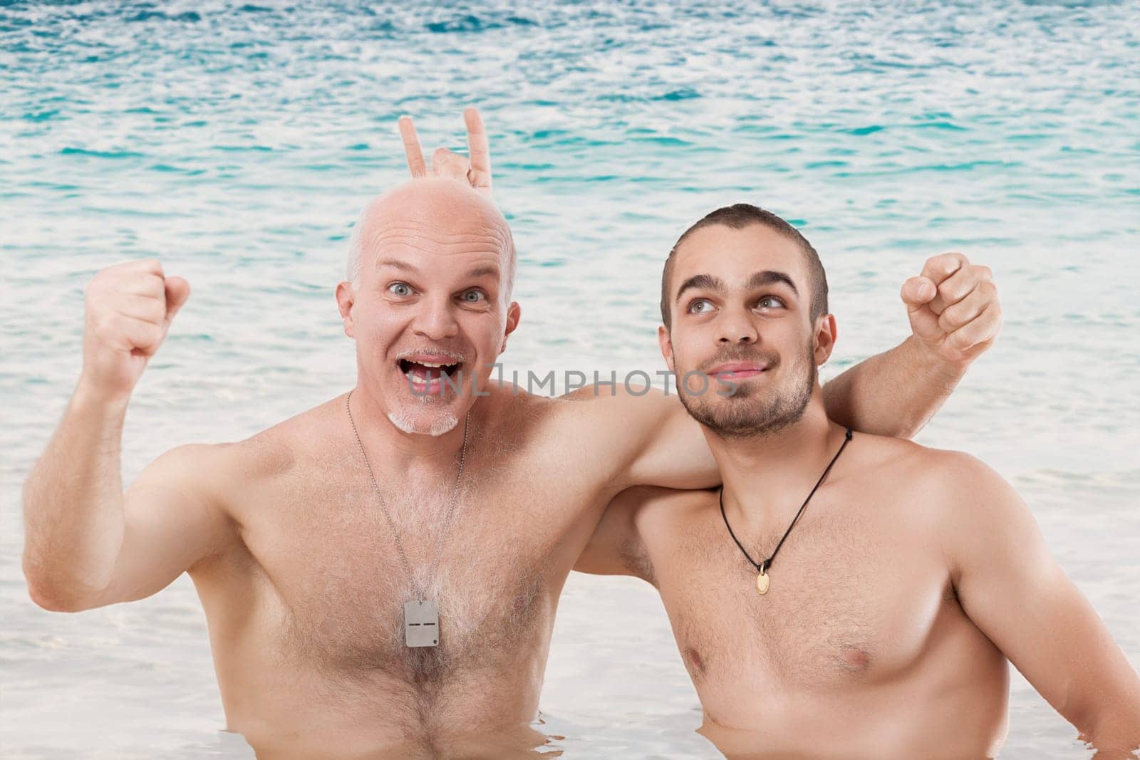 Bald man exudes joy with younger companion at a seaside
