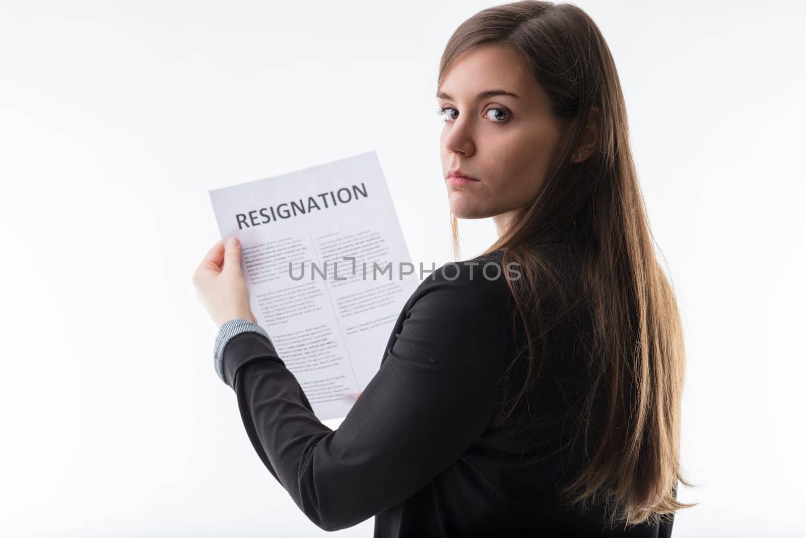 Serious expression on woman facing the implications of resignation