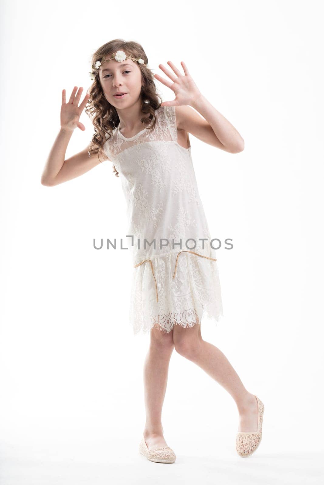 Playful girl emulates the Charleston dancers of the Roaring Twenties