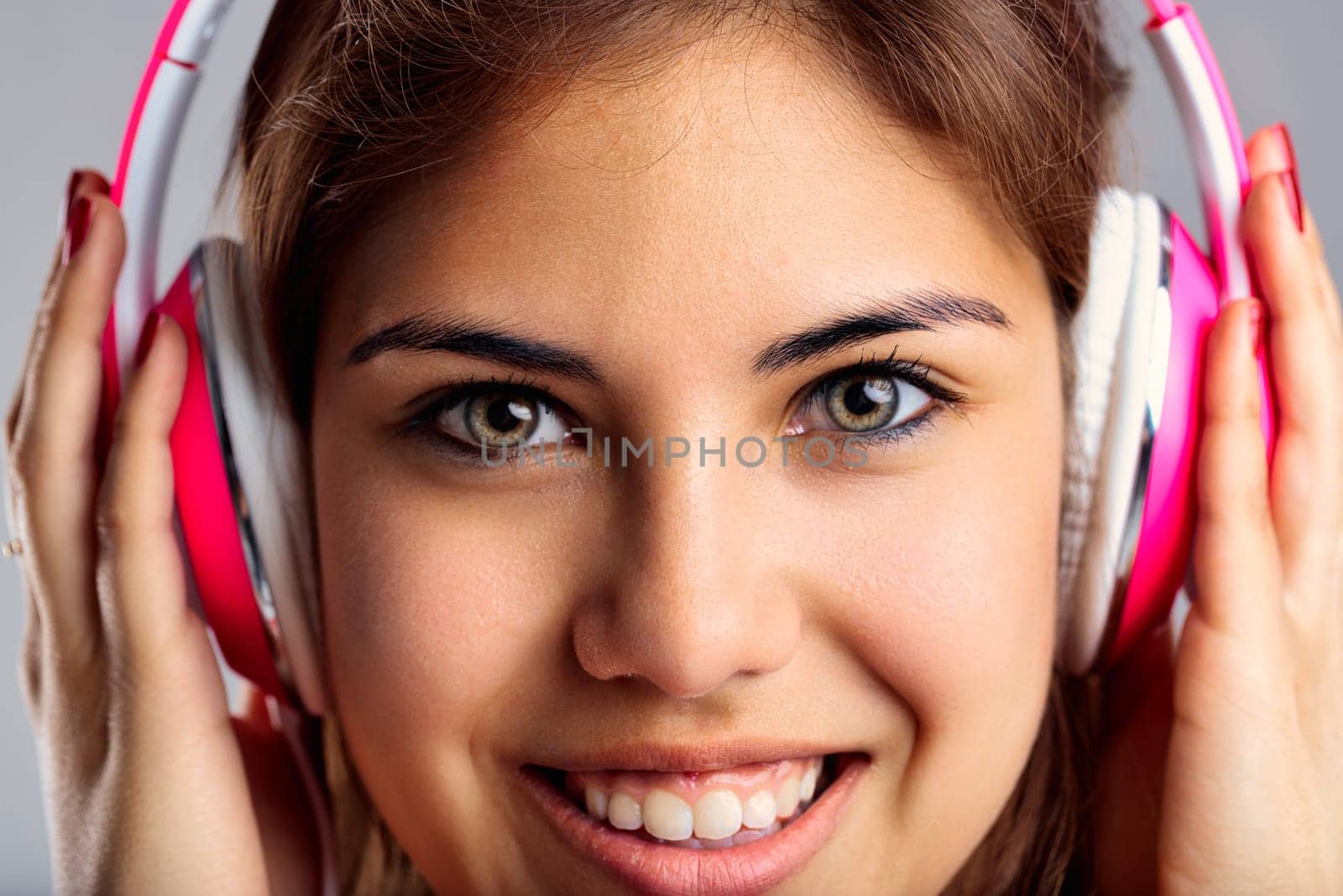 The portrait showcases a music lover adorned with fashionable headphones and casual chic