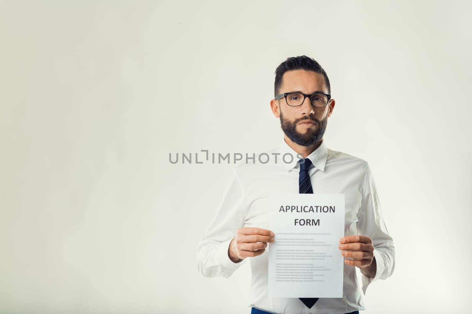 Career-driven professional confidently displays an application, signaling readiness for advancement