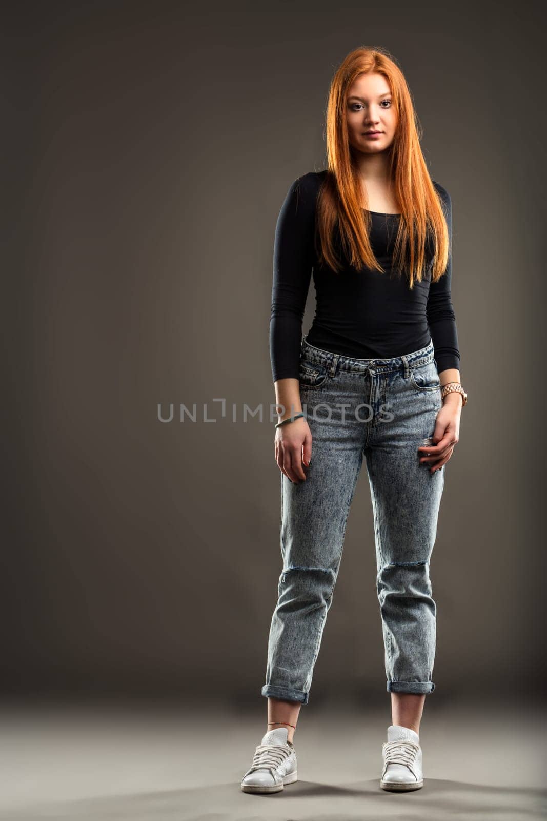 Contemporary and comfortable, her attire speaks to a modern casual fashion sense paired with practicality