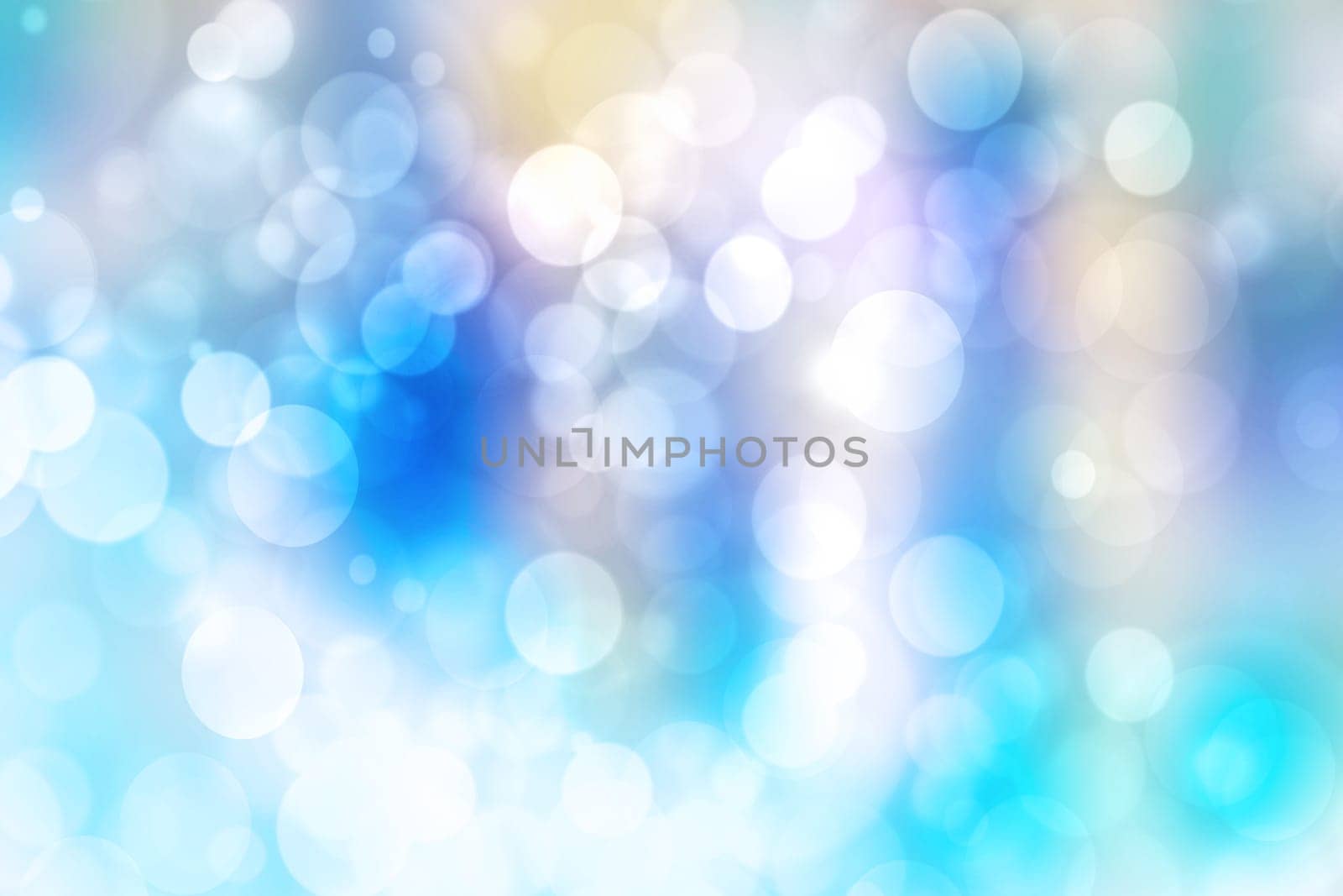 Abstract gradient light blue turquoise yellow green shiny blurred background texture with circular bokeh lights. Beautiful fresh backdrop. Space for design.
