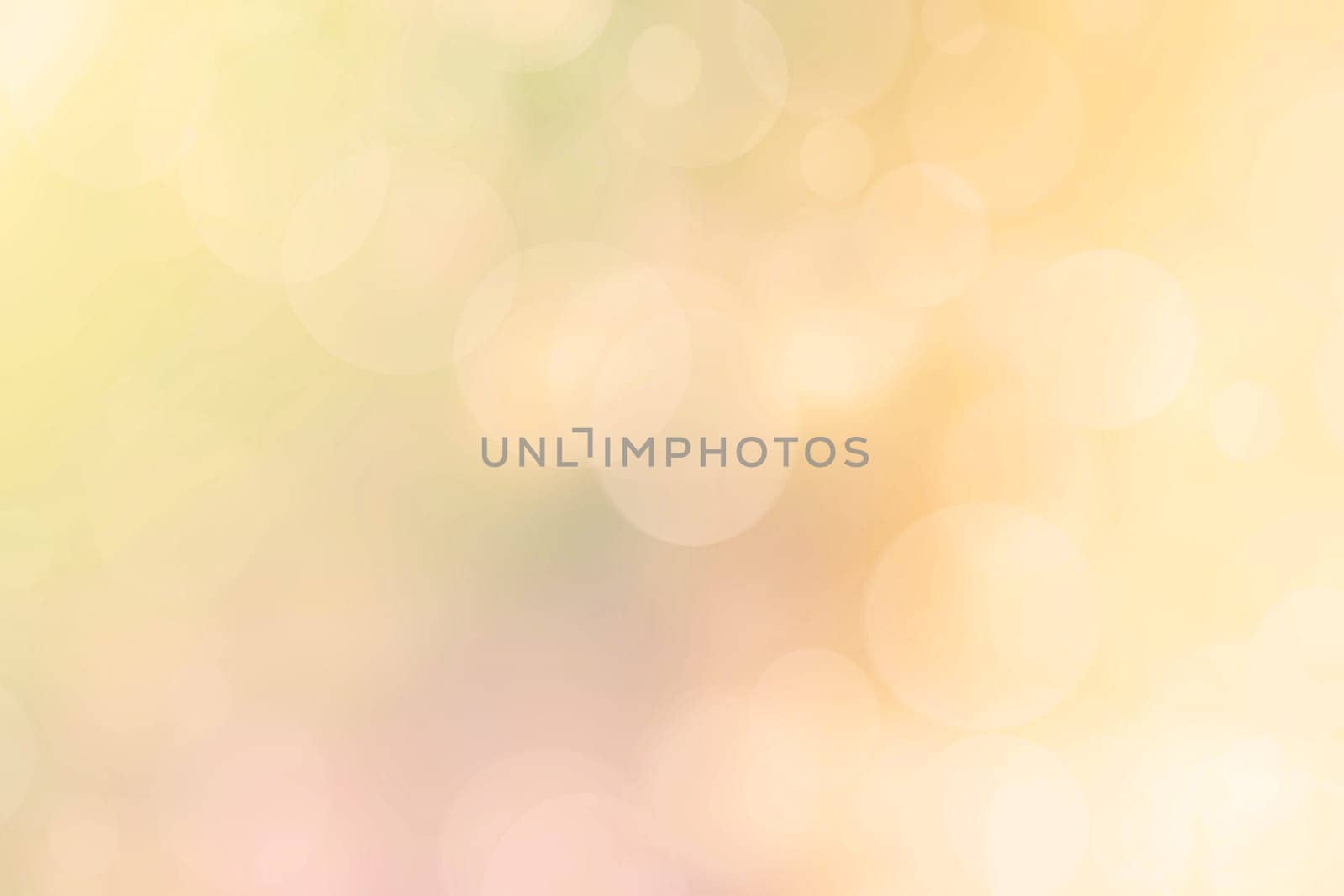 Abstract blurred fresh vivid spring summer light delicate pastel yellow pink orange bokeh background texture with bright circular soft color lights and stars. Beautiful backdrop illustration.