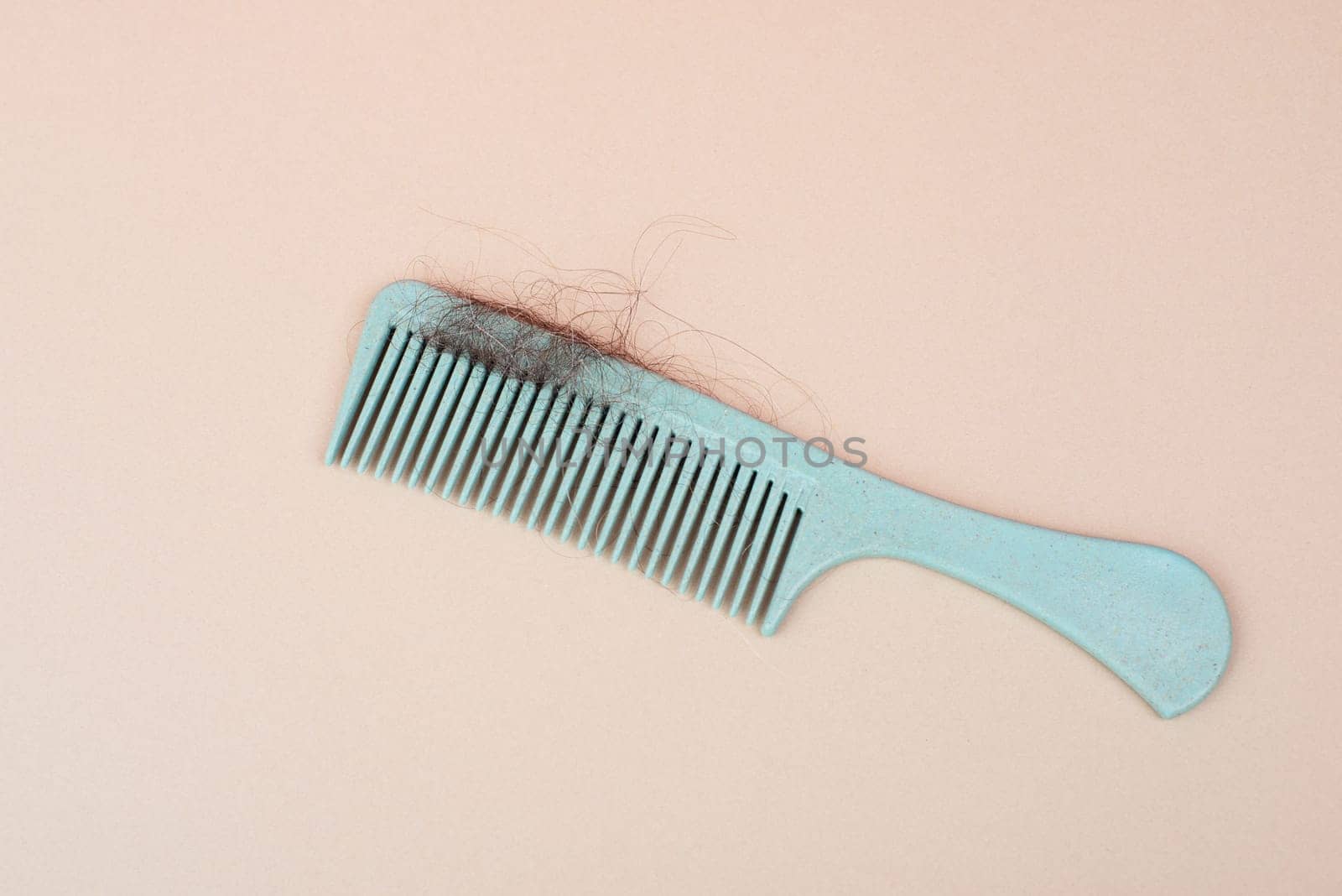 Comb with hair loss, health problem, issue of aging, alopecia areata by stress or infection, hairbrush