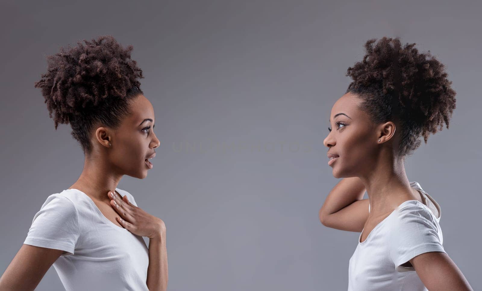 Exchange of whispers between a black woman and her reflection, indulging in the joy of gossip