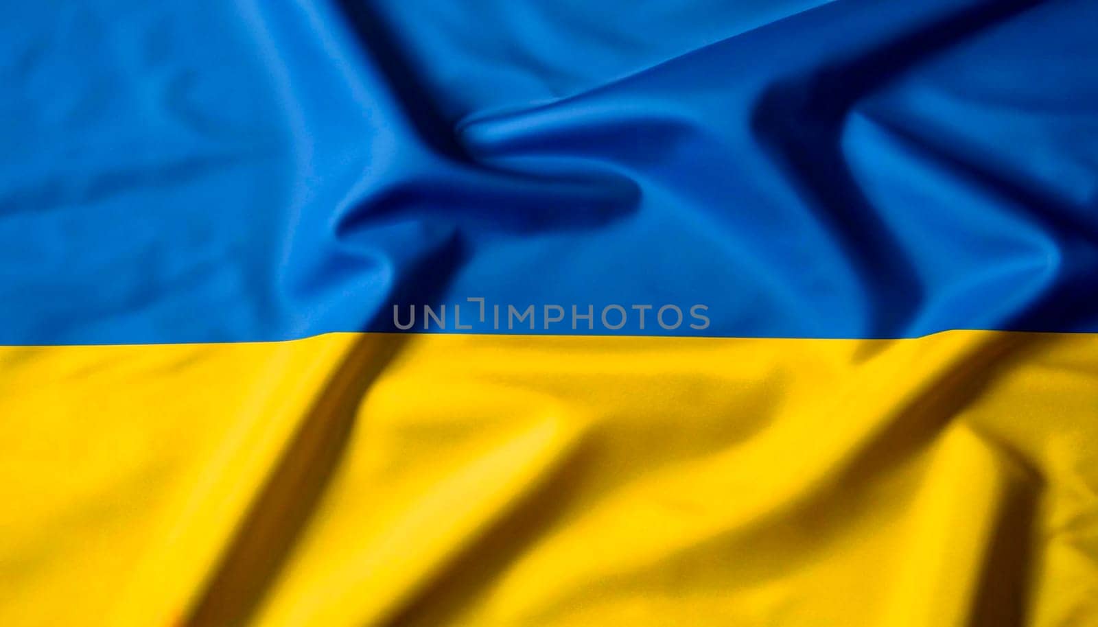 Beautiful silk flag of Ukraine with soft folds in the wind.