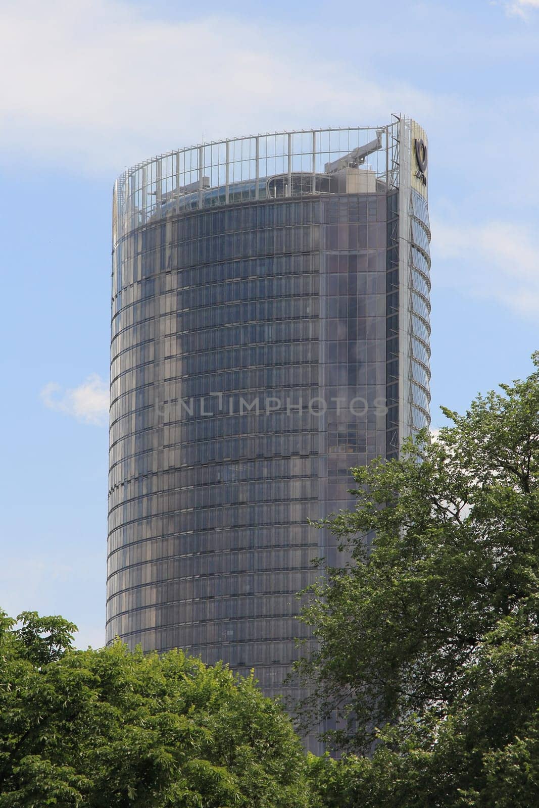 Bonn, Germany Jun 10, 2019: Post Tower is the headquarters of the logistic company Deutsche Post DHL with the two brands postal services for Germany Deutsche Post and the worldwide logistics company DHL.