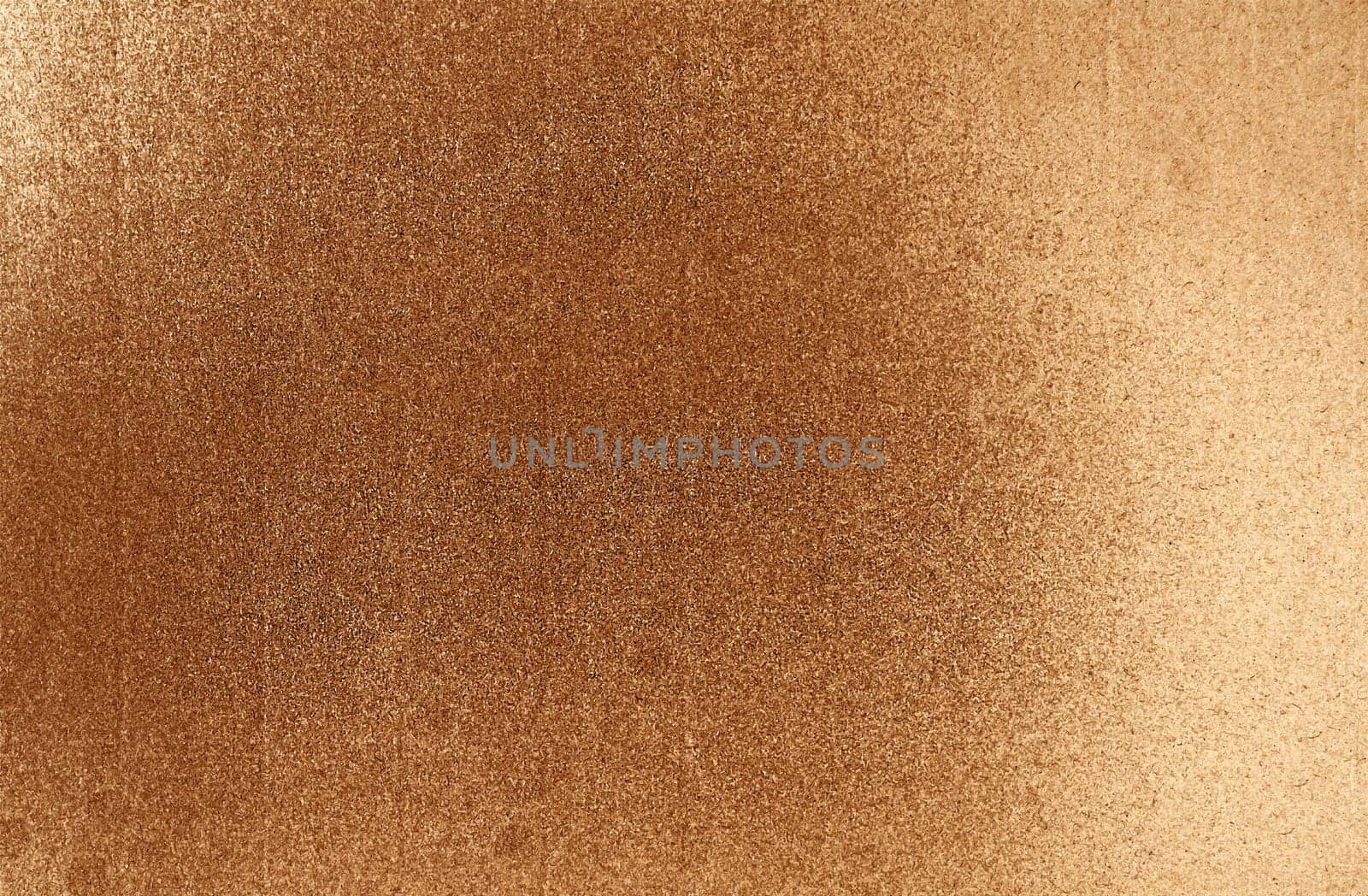 The background is an old brown rough surface with grain and horizontal veins
