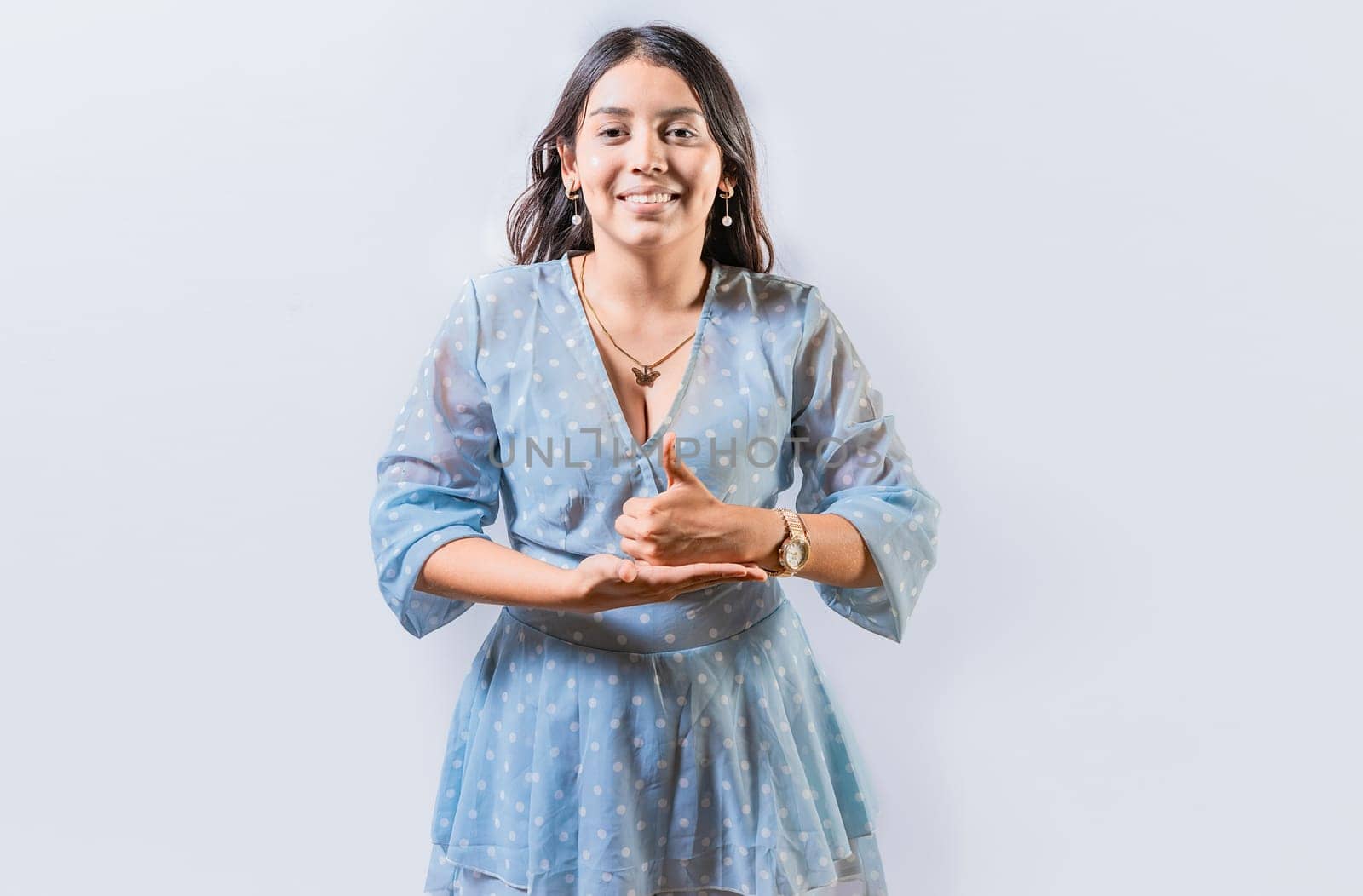 Girl gesturing help with hands in sign language. Person showing help gesture with hands in sign language