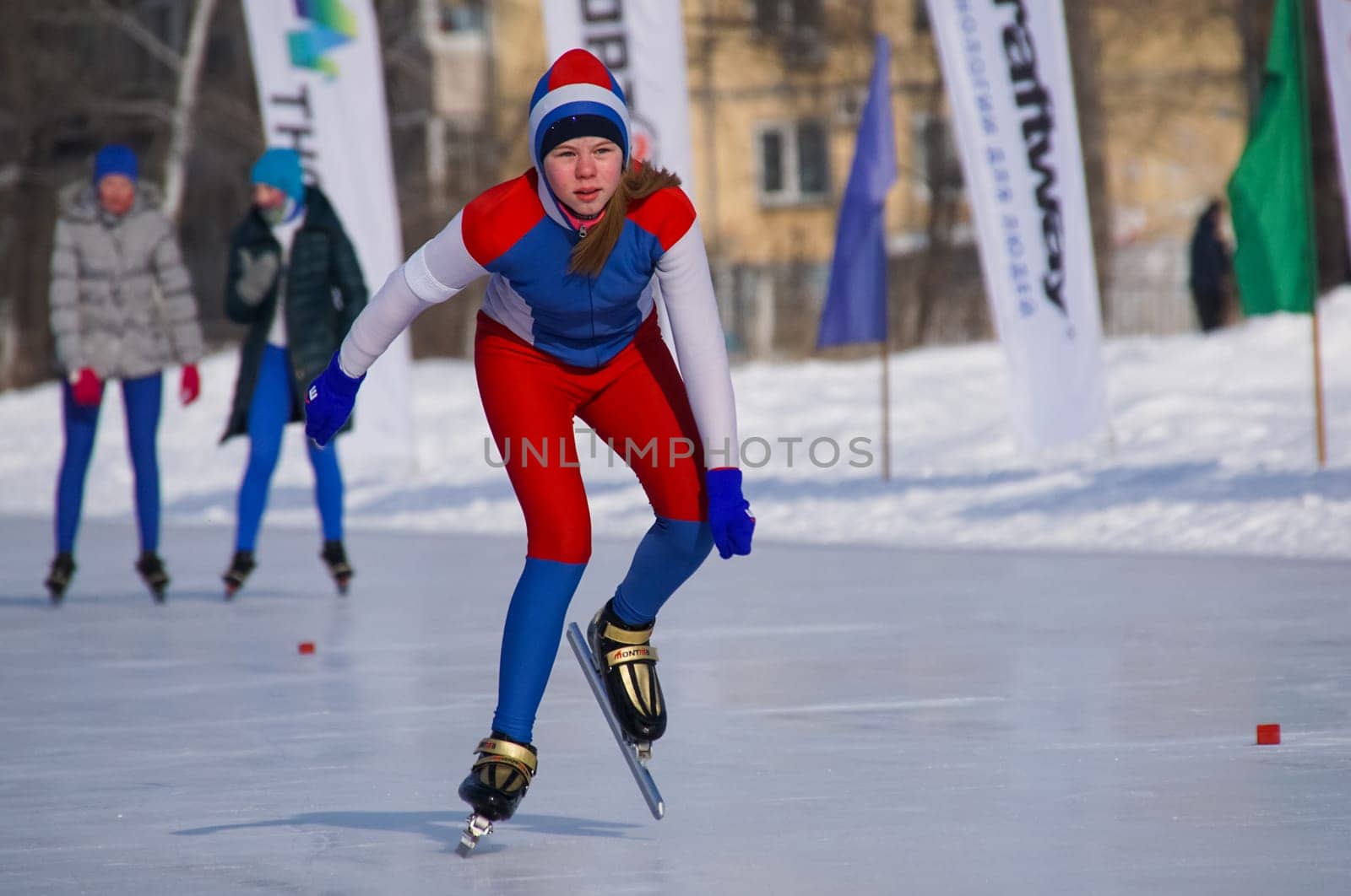 Russia, Volgodonsk - January 18, 2015: Skating. Training for riding on skates on the ice