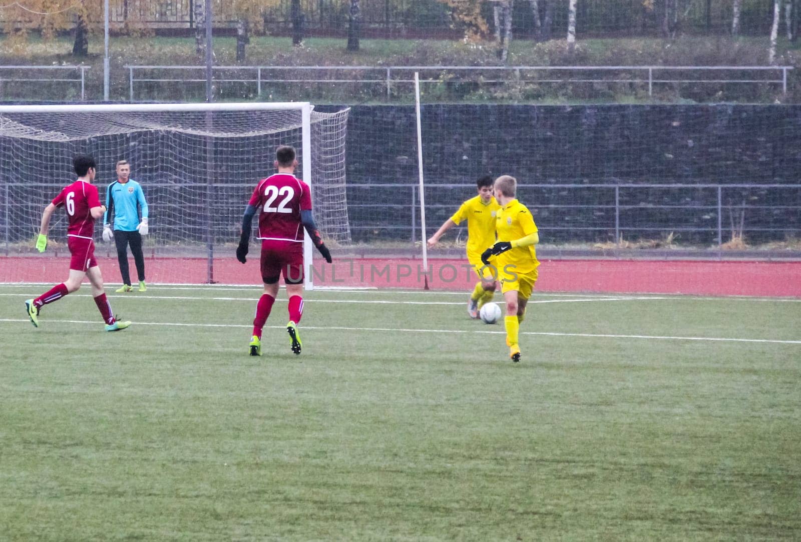 Russia, Volgodonsk - may 17, 2015: Football game. Training matches junior teams and fans