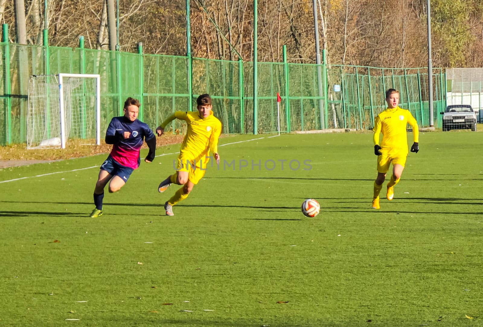 Russia, Volgodonsk - may 17, 2015: Football game. Training matches junior teams and fans