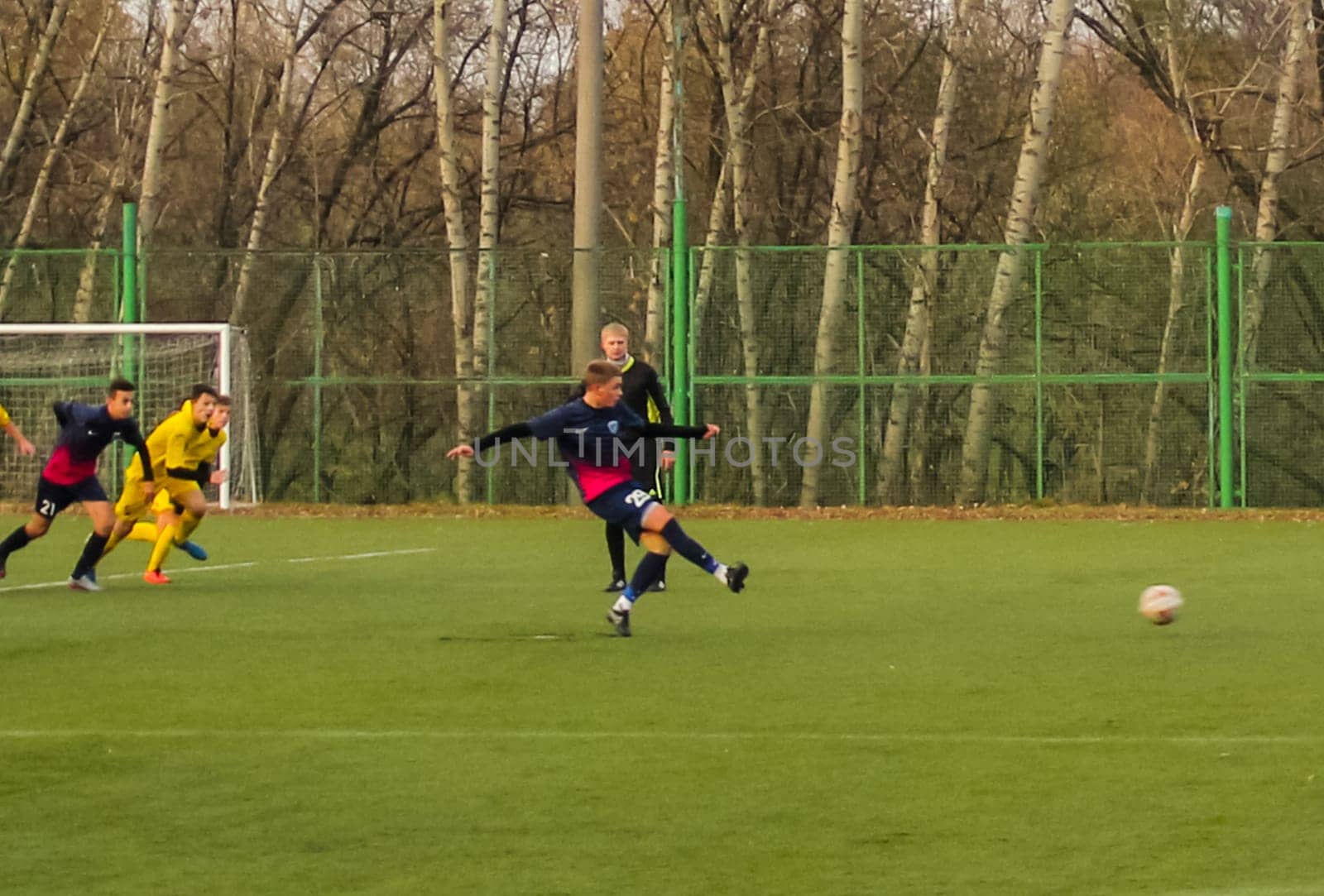 Russia, Volgodonsk - may 17, 2015: Football game. Training matches junior teams and fans