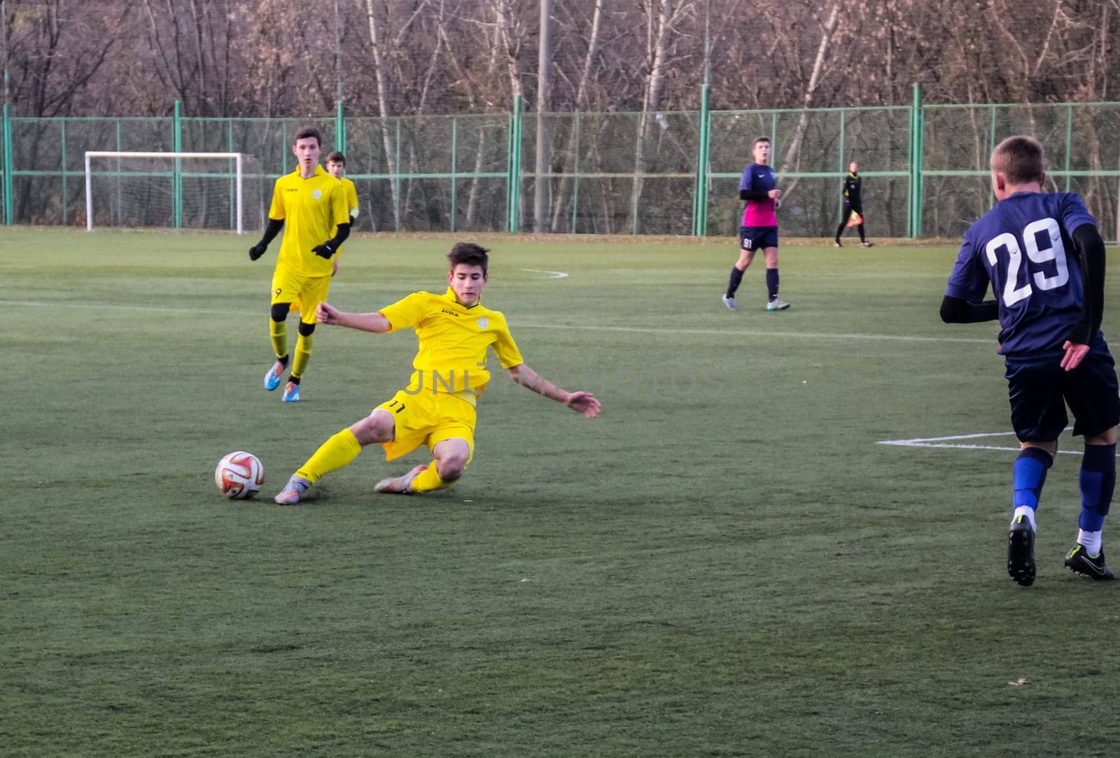 Russia, Volgodonsk - may 17, 2015: Football game. Training matches junior teams and fans