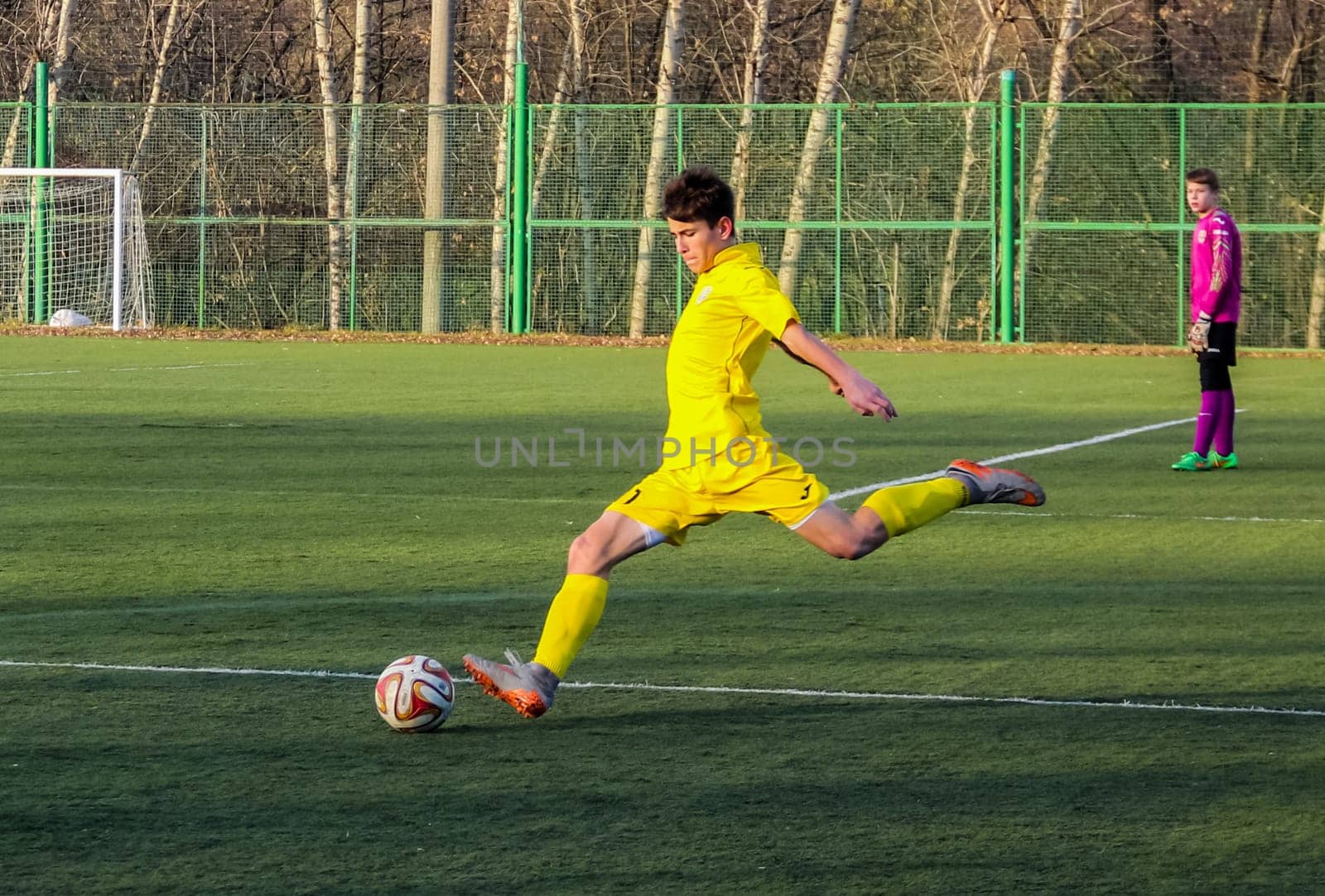 Russia, Volgodonsk - may 17, 2015: Football game. Training matches junior teams and fans