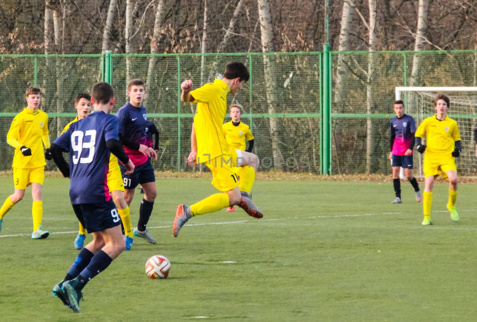 Russia, Volgodonsk - may 17, 2015: Football game. Training matches junior teams and fans