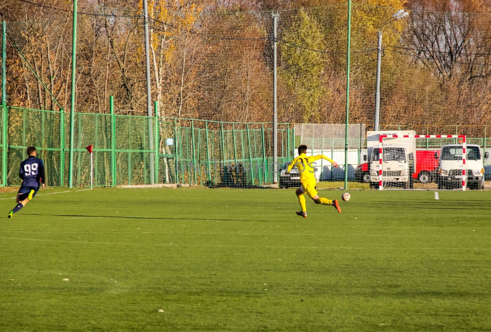 Russia, Volgodonsk - may 17, 2015: Football game. Training matches junior teams and fans