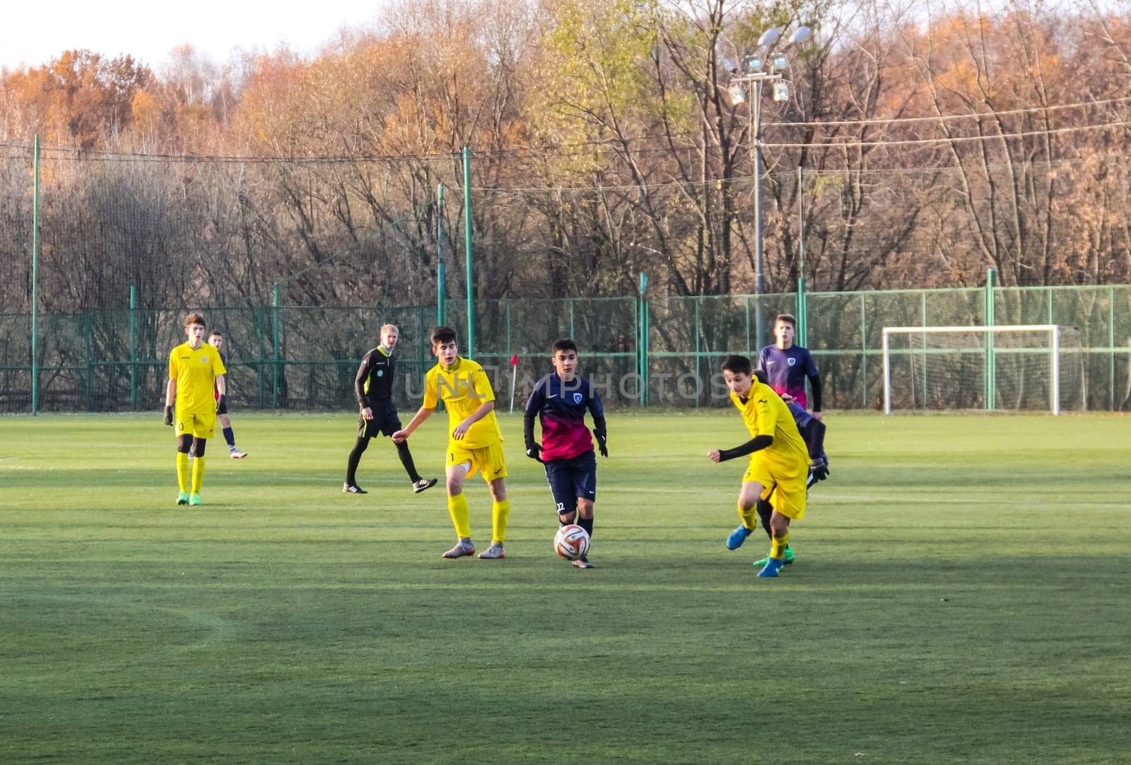 Russia, Volgodonsk - may 17, 2015: Football game. Training matches junior teams and fans