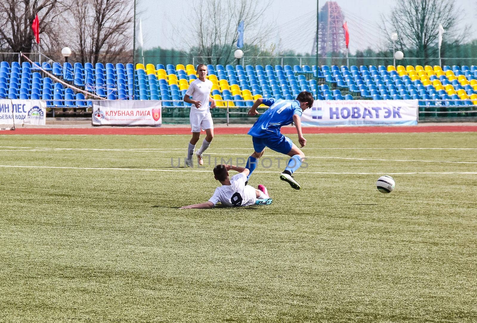 Russia, Volgodonsk - may 17, 2015: Football game. Training matches junior teams and fans