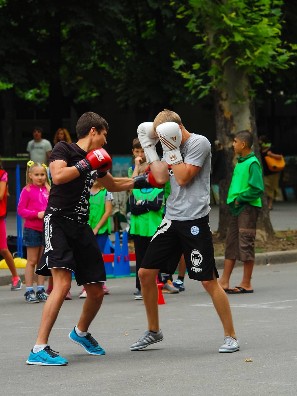 Boxing. Mens are trained in sparring.