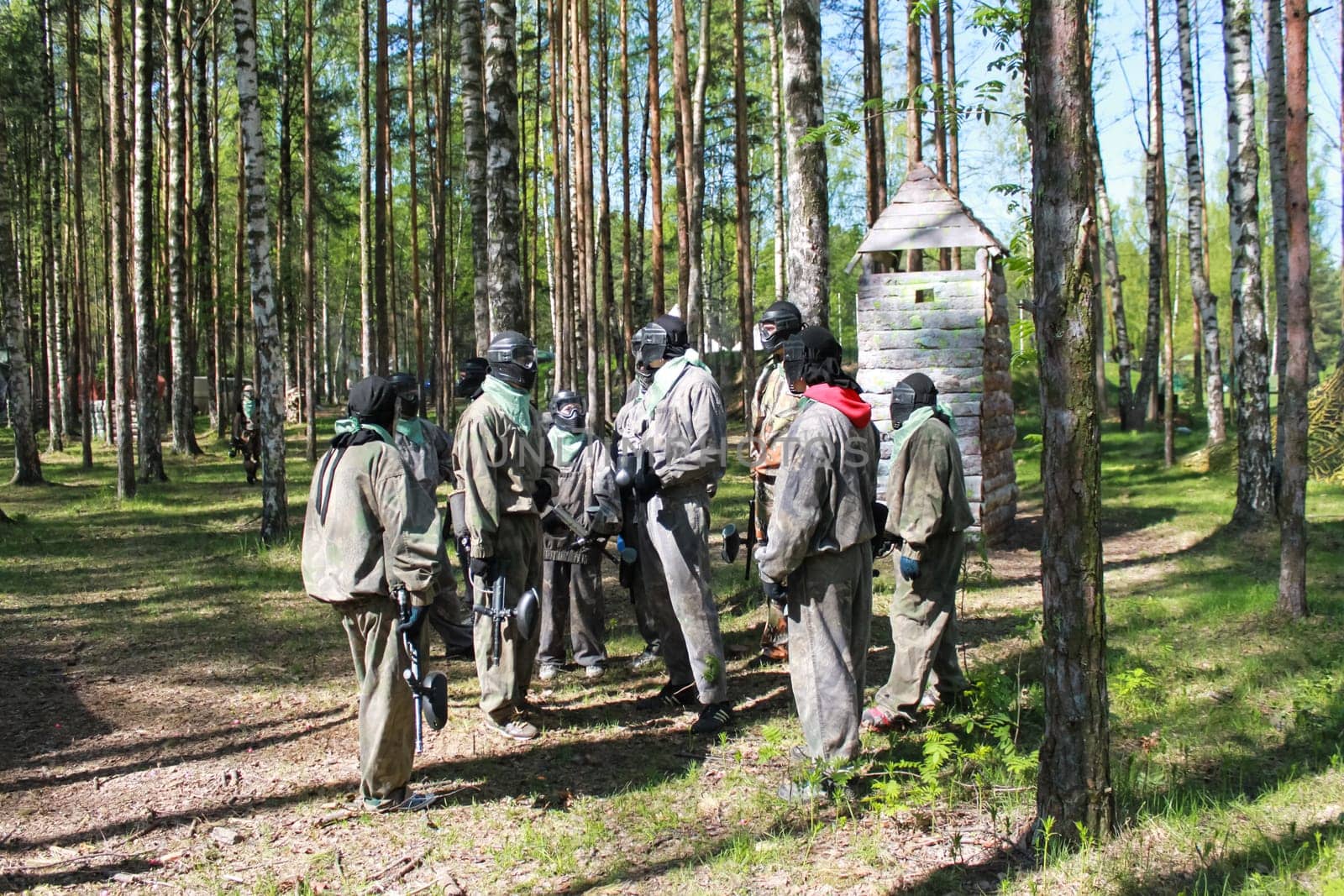 Russia, Volgodonsk - June 30, 2015: Paintball. Shooting competition of weapons with paint balls. Forest tournament