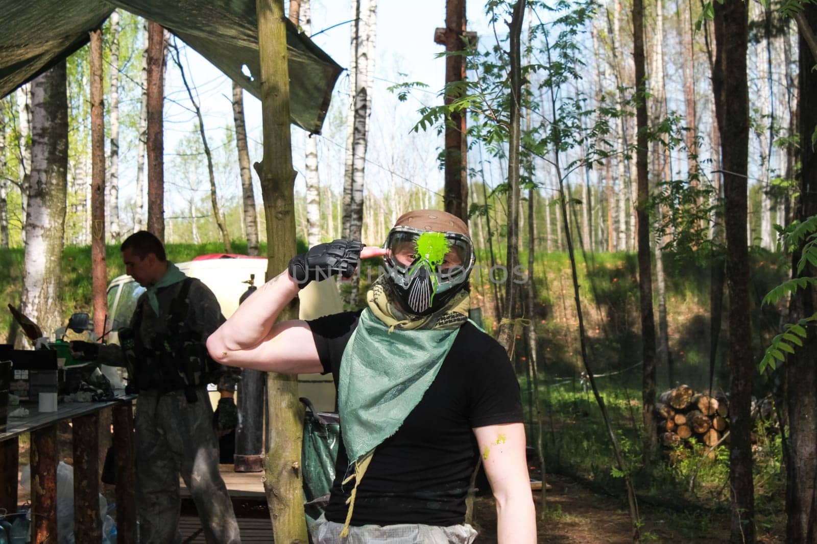 Russia, Volgodonsk - June 30, 2015: Paintball. Shooting competition of weapons with paint balls. Forest tournament