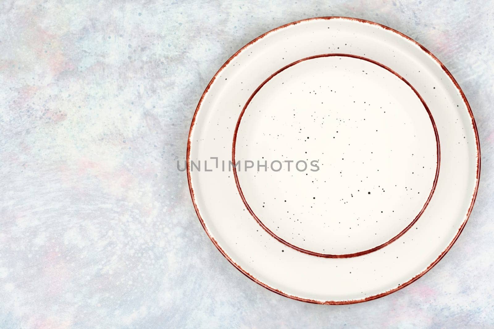Empty ceramic plates on the table. Card or menu template. Tableware, crockery. Top view.