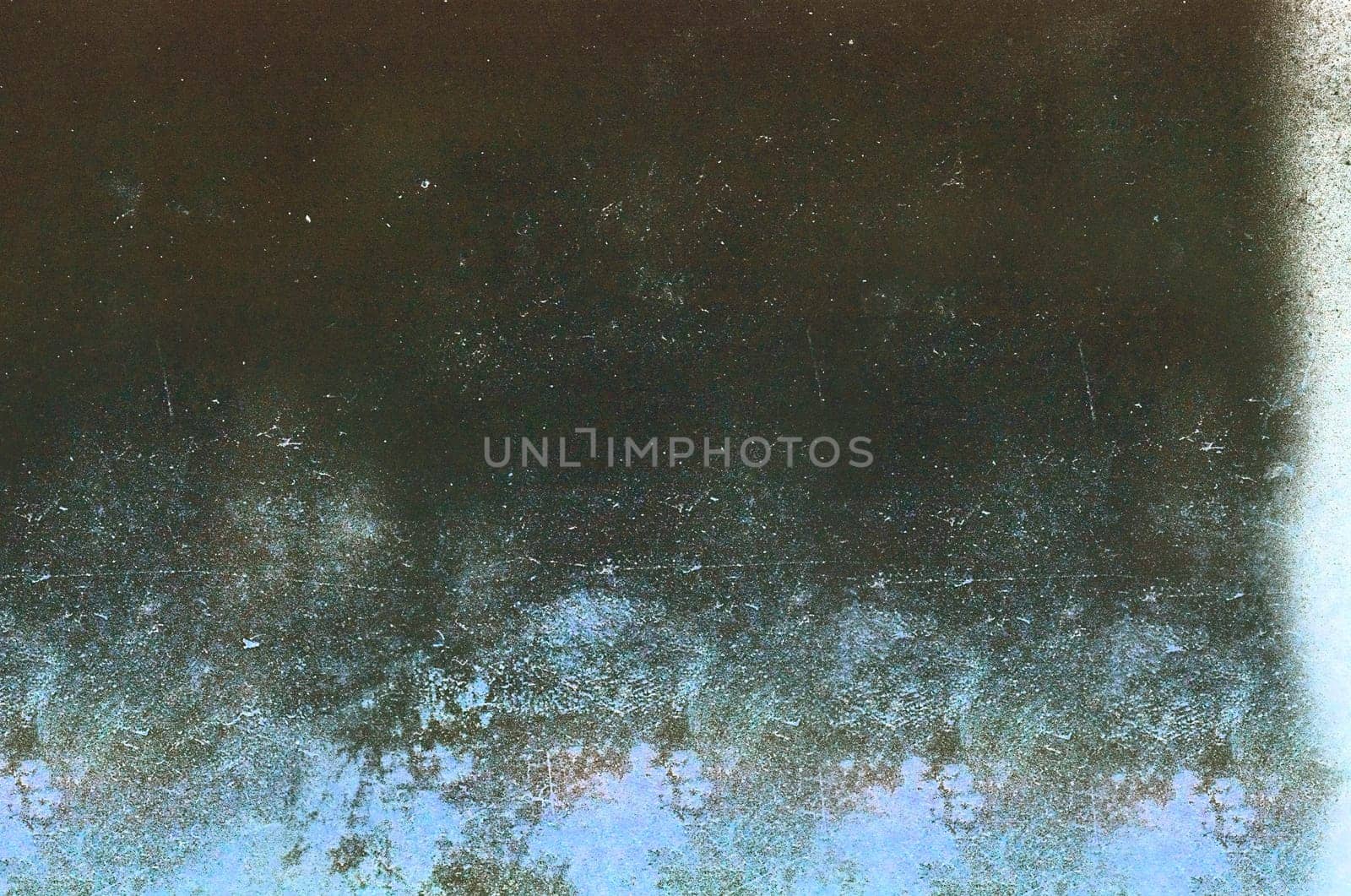 Rough grunge-style surface with spots and streaks on the surface