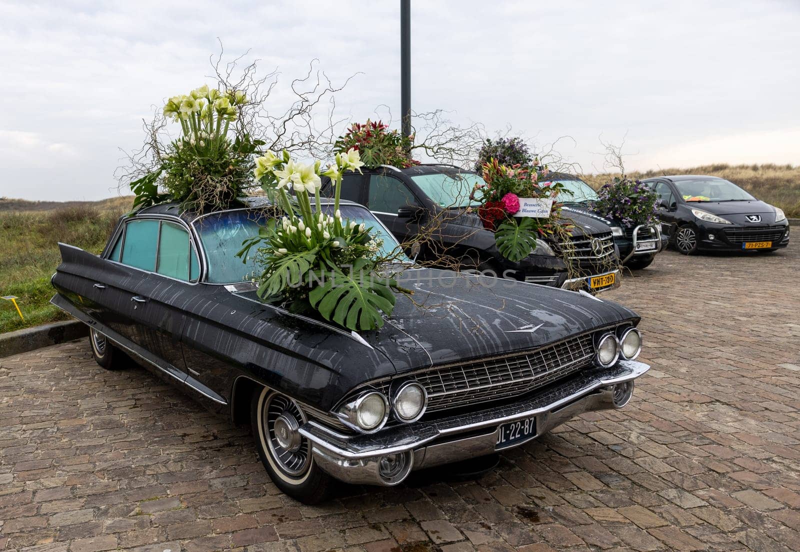 Noordwijk, Netherlands - April 22, 2023: Cars decorated with flowers taking part in the Bloemencorso Bollenstreek the annual spring flower parade from Noordwijk to Haarlem in the Netherlands.
