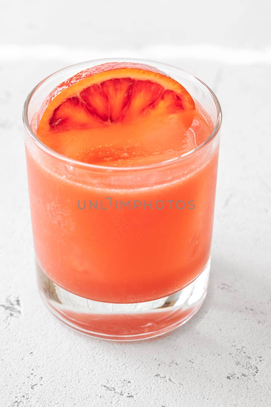 Sicilian Negroni cocktail garnished with orange wheel