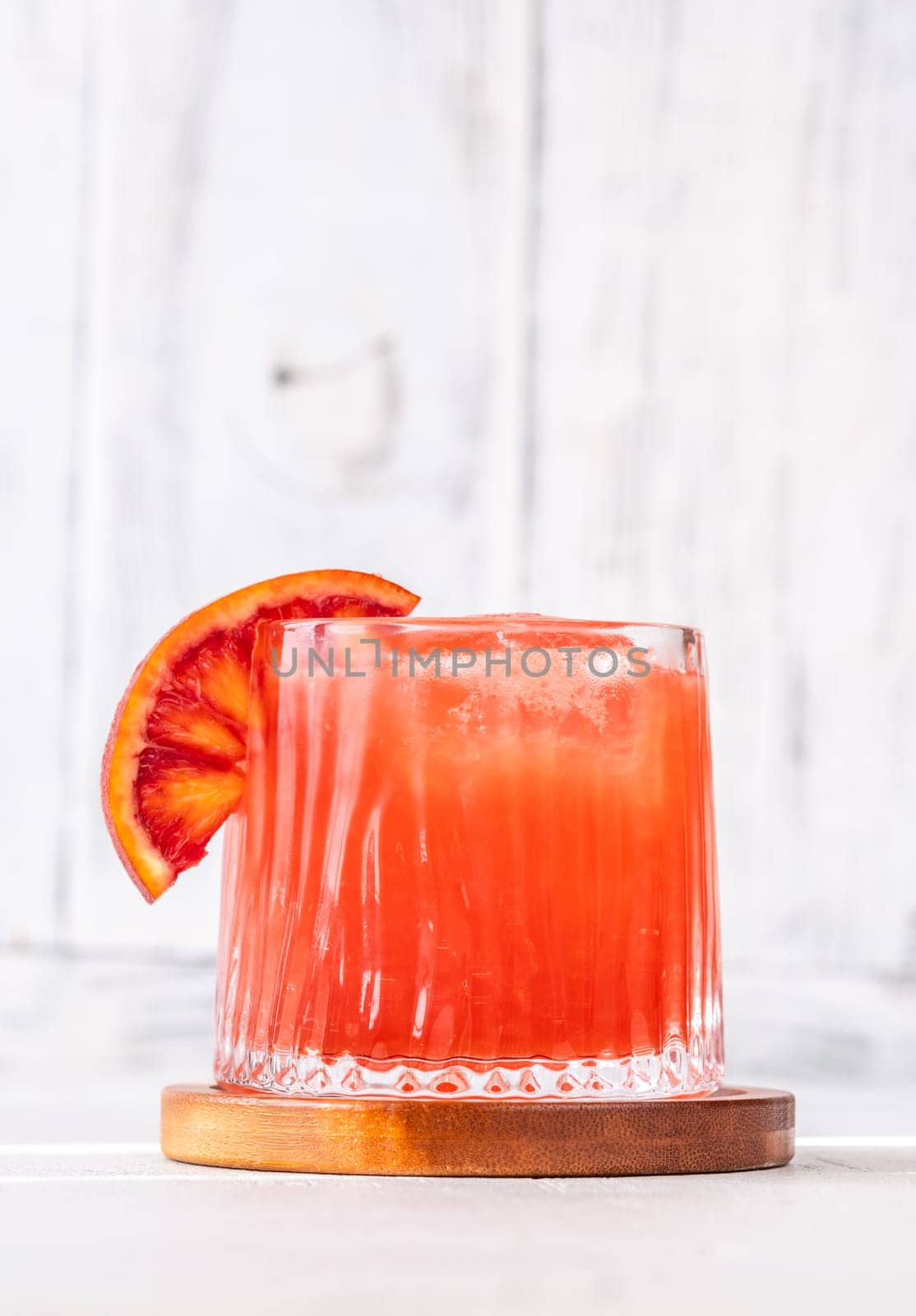 Sanguinello Cocktail garnished with blood orange wheel