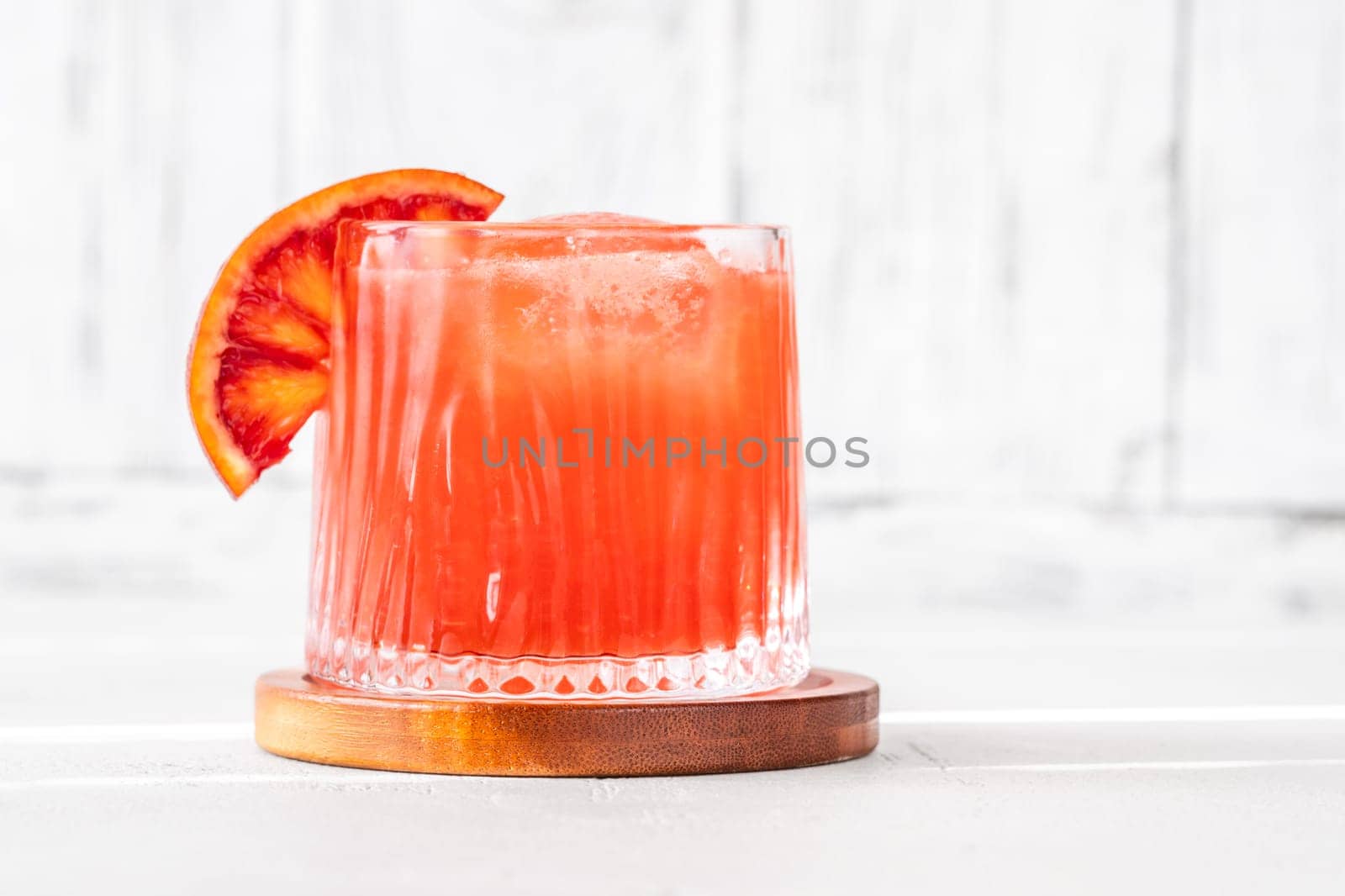 Sanguinello Cocktail garnished with blood orange wheel
