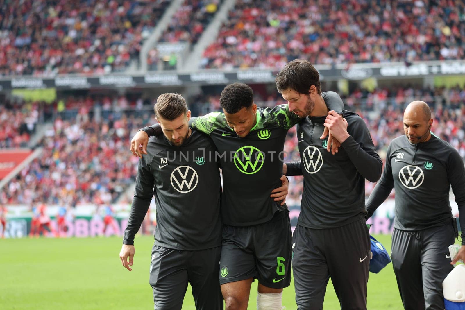 Aster Vranckx (VfL Wolfsburg) had to leave the pitch early with a serious injury in the match of the 1. FBL: 23-24: 31. Sptg. SC Freiburg - VfL Wolfsburg  DFL REGULATIONS PROHIBIT ANY USE OF PHOTOGRAPHS AS IMAGE SEQUENCES AND/OR QUASI-VIDEONann  Photo: Joachim Hahne/johapress
