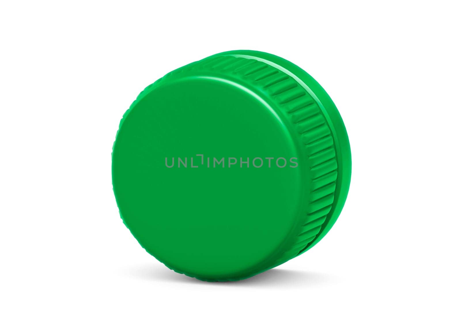 Green plastic bottle caps isolated on white background