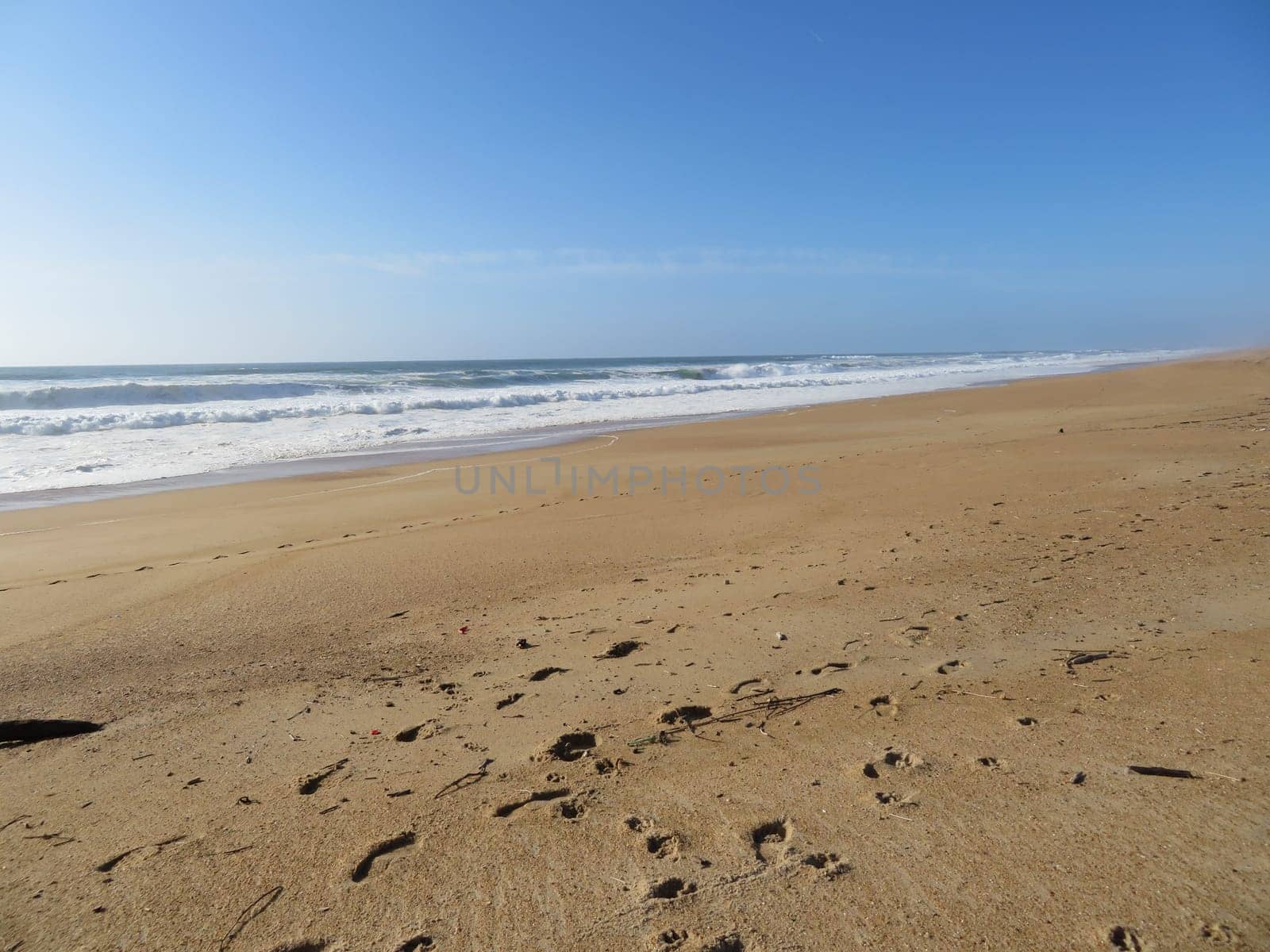 beautiful beach with the sea and its heat waves sun sky water salt air