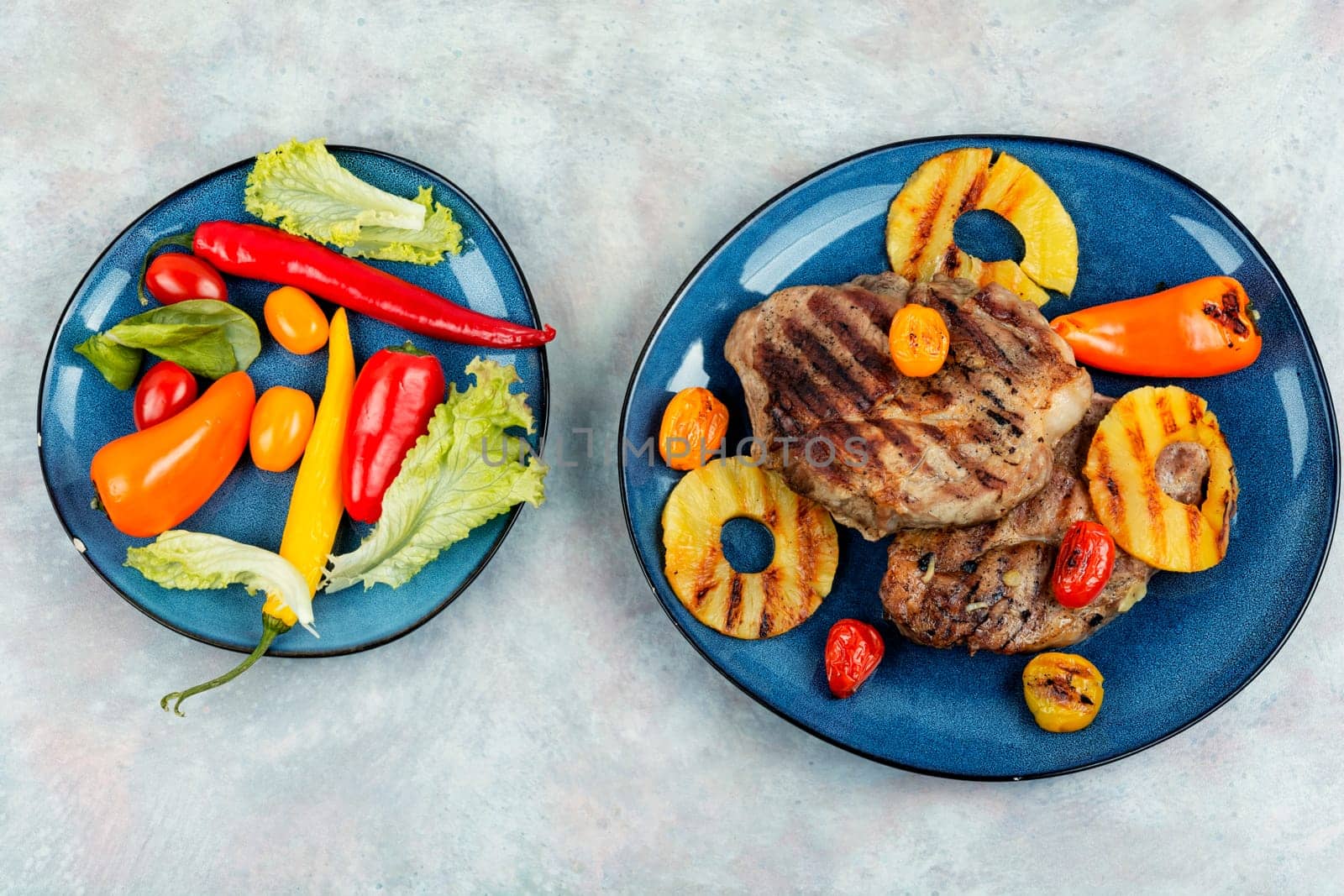 Yummy grilled meat,roasted with pineapple. Grilled steak and ananas, bbq. Top view.