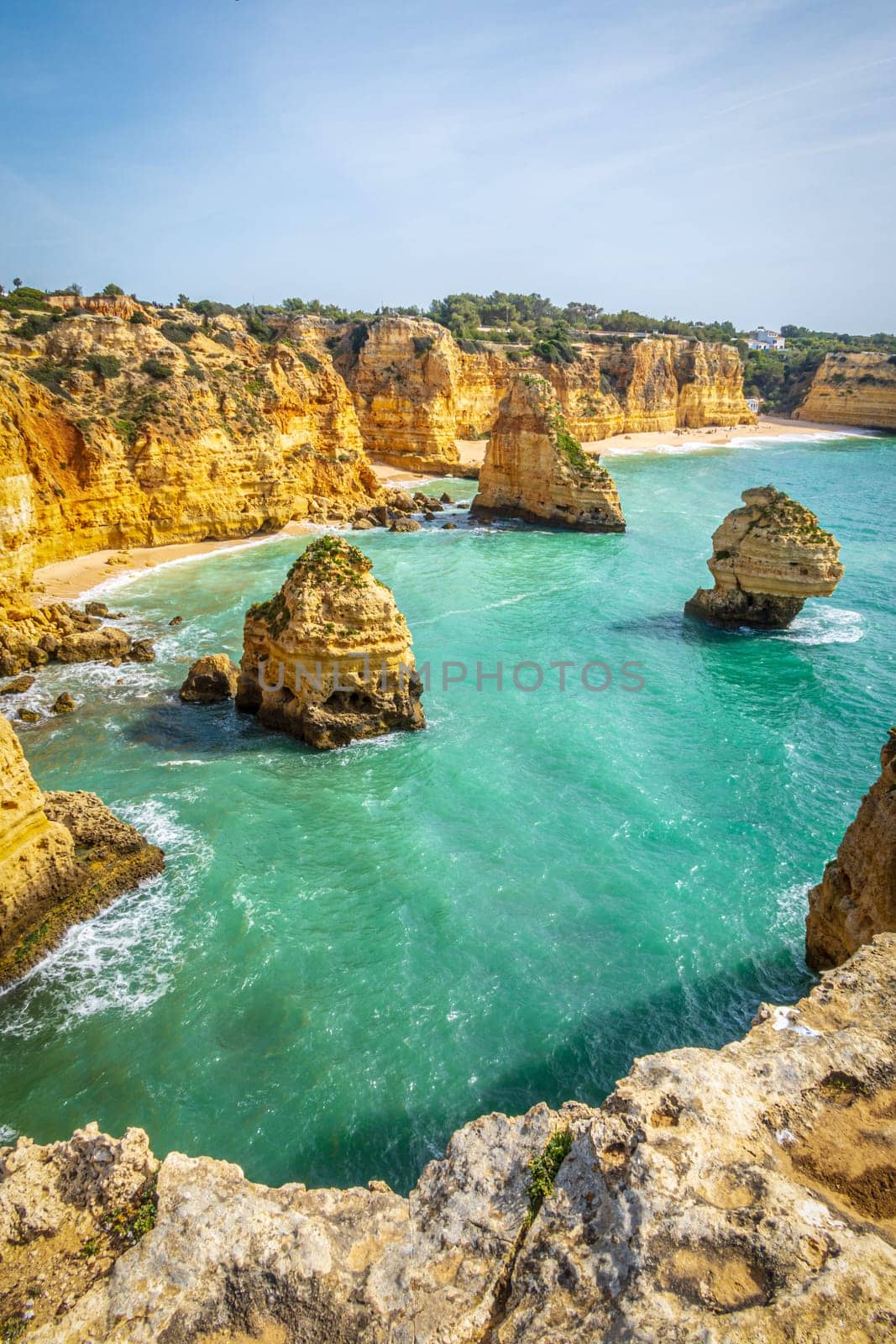 Vertical photography of spectacular cliffs near Marinha beach and Benagil in Algarve, Portugal