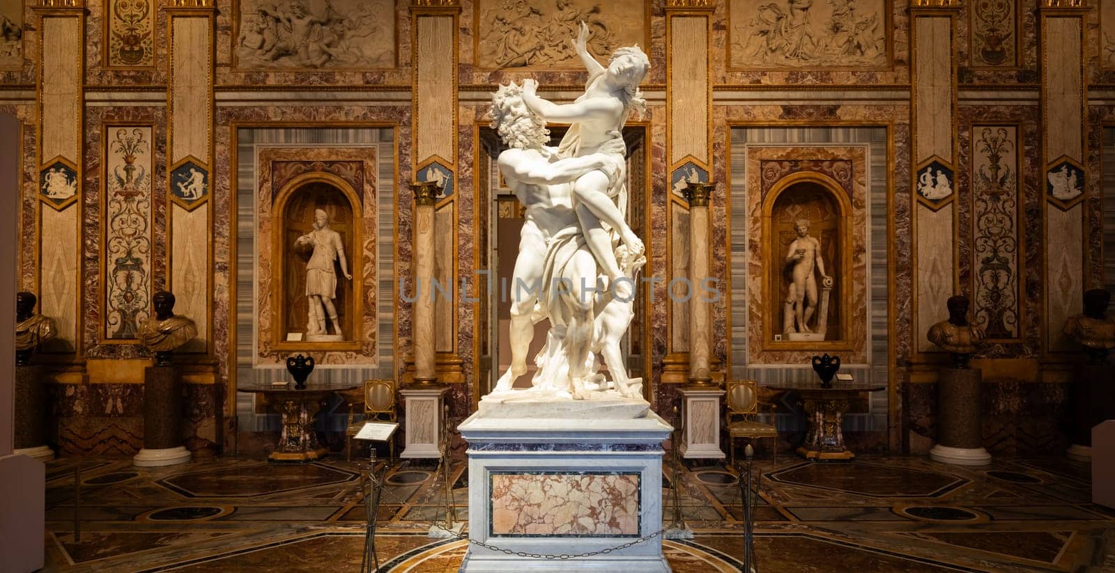 Rome, Italy - 28 December 2023: The Rape of Proserpina by Gian Lorenzo Bernini, 1622. Baroque marble sculpture in Galleria Borghese.