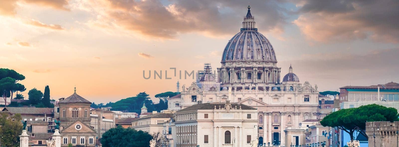 ROME, ITALY - JUNE 2023: Tiber river bridge with Vatican City and dome of Saint Peter Cathedral