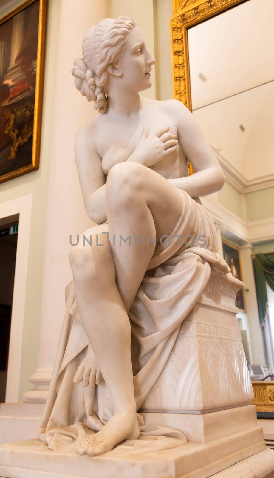 Florence, Italy - 27 July 2023: Pitti Palace Museum, Susanna statue by O. Fantacchiotti. Beautiful nude woman in classic figure
