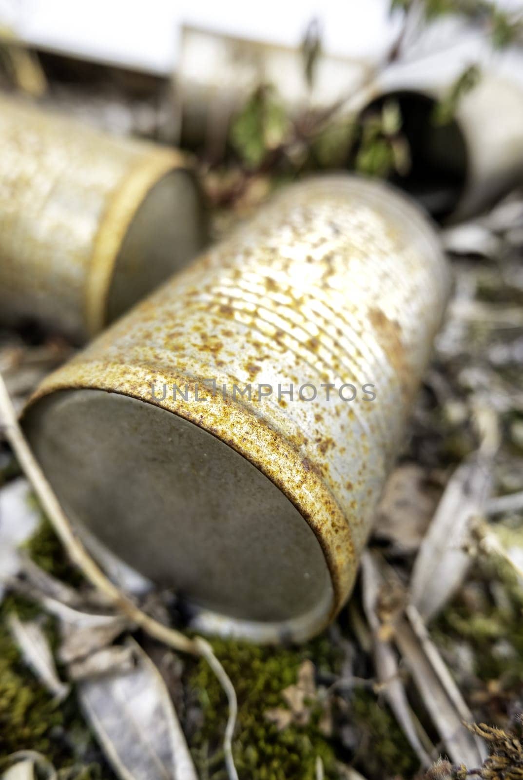 Detail of old metal can, garbage and pollution