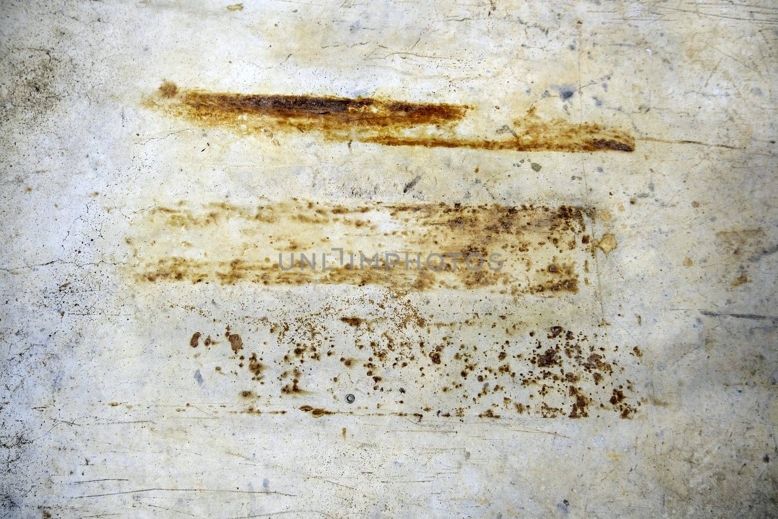 Detail of a rough and rusty metal plate due to the passage of time