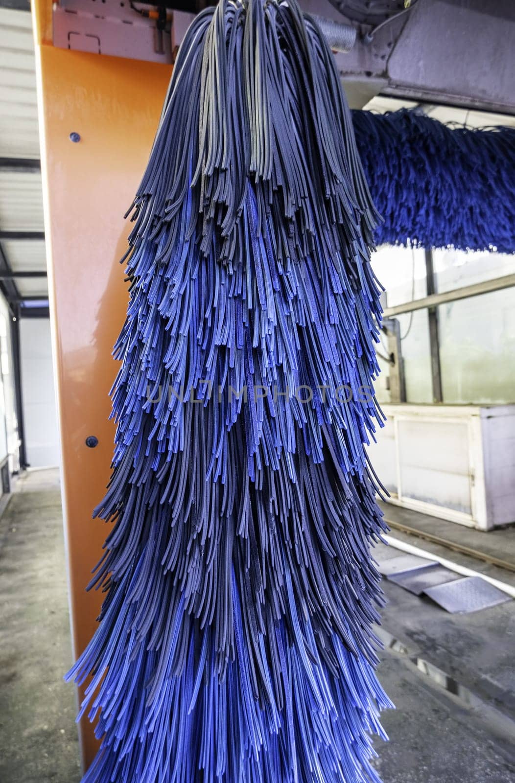Detail of a car wash in the city, vehicle cleaning