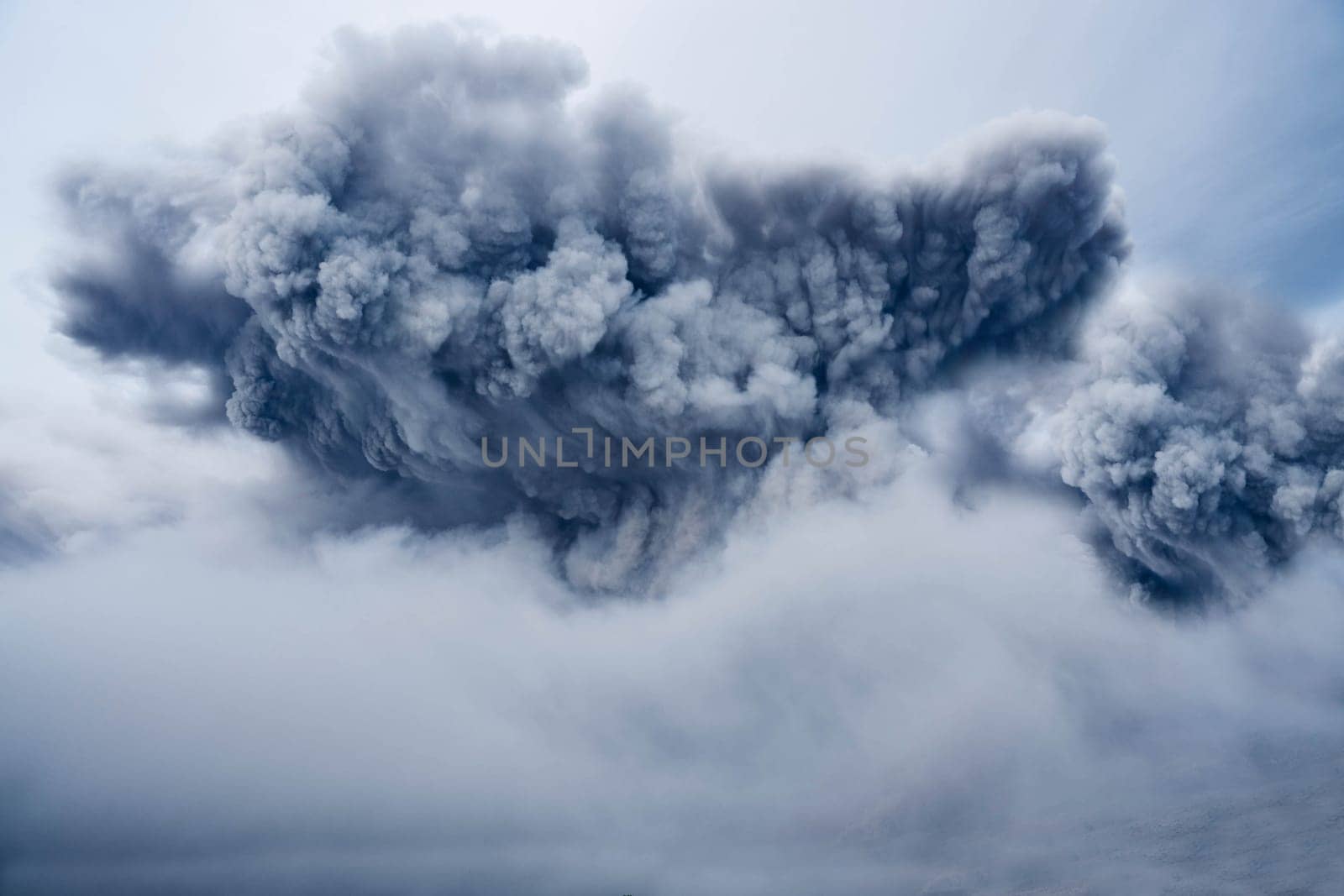 A rising cloud of gray volcanic smoke. Texture or background