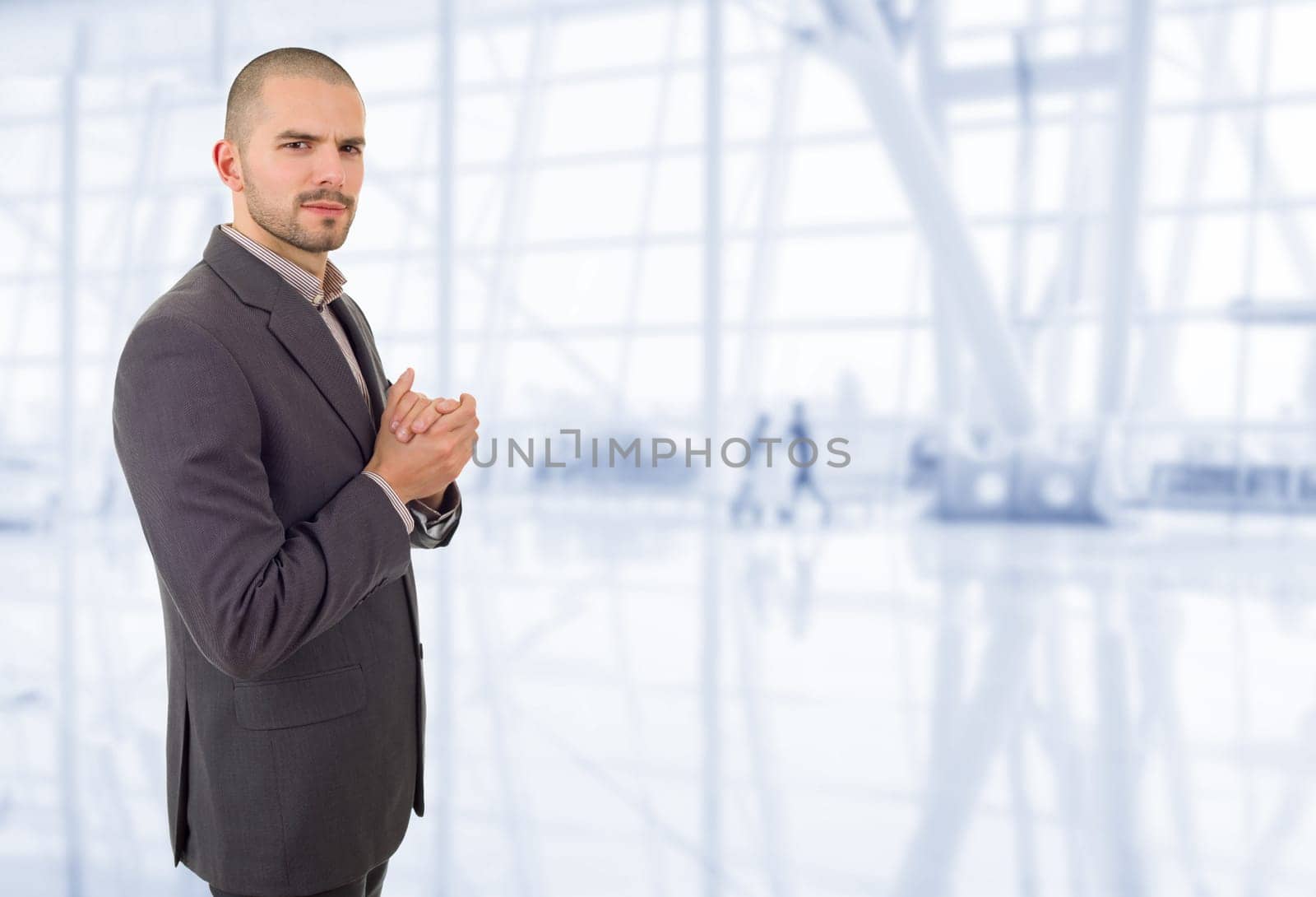 young business man portrait at the office