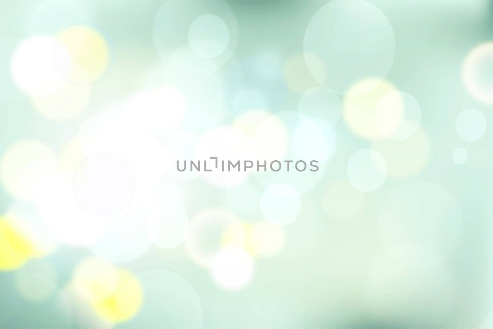 Abstract gradient light blue turquoise yellow green shiny blurred background texture with circular bokeh lights. Beautiful fresh backdrop. Space for design.
