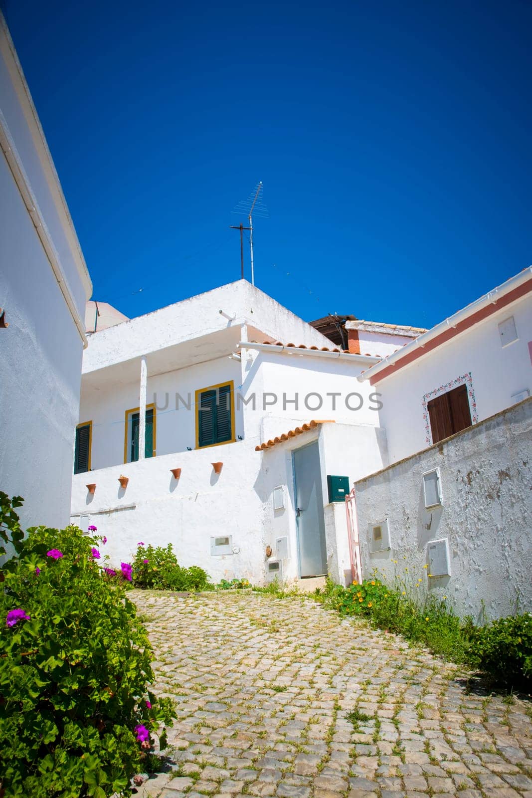 Alte, Portugal, April 18th 2024: View on the cozy streets of the little village Alte in Algarve, Portugal